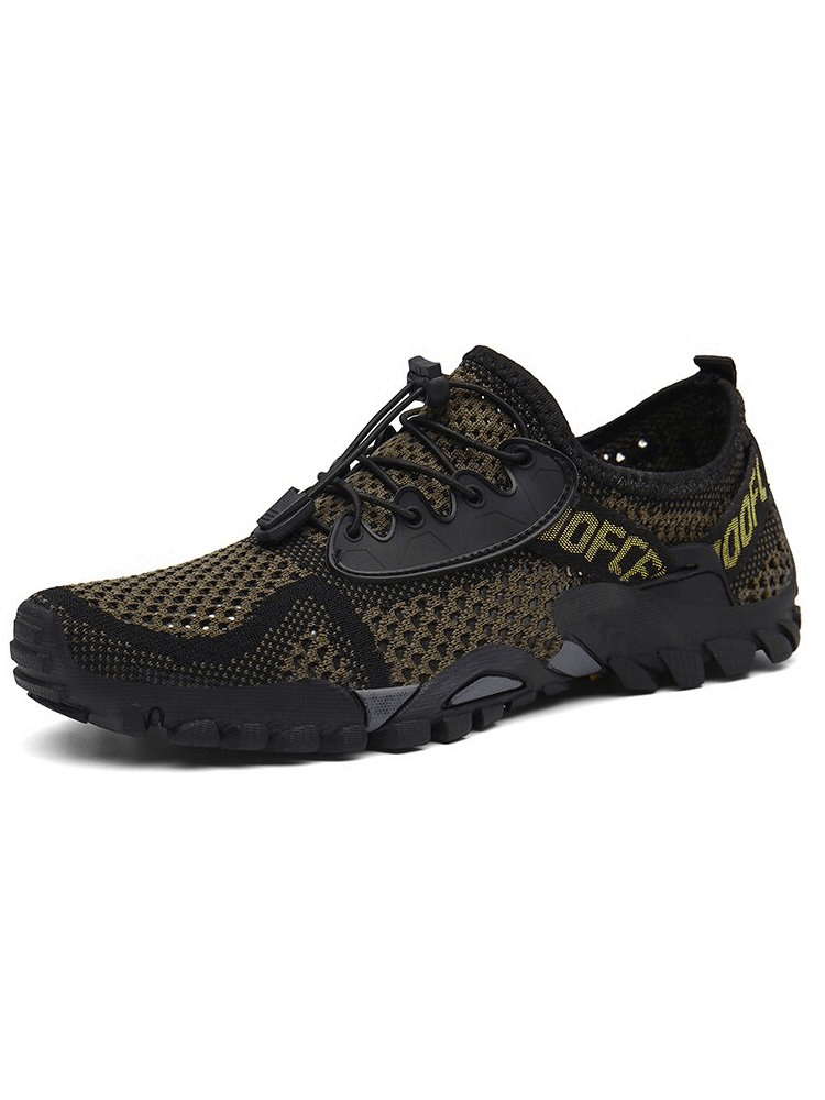 Breathable men's sports sneaker with elastic mesh, durable rubber sole, and lace-up closure, ideal for camping and outdoor activities.